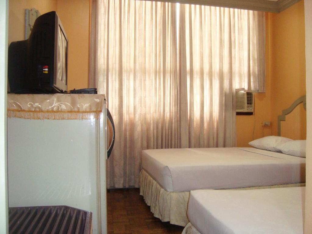 Cebu Northwinds Hotel Szoba fotó
